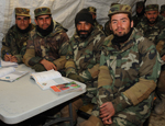 ANA recruits at the Kabul Military Training Centre improve their literacy skills.