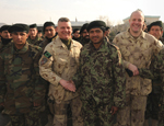 MWO Willy MacDonald (second from left) and Maj Jon Hamilton (second from right) with graduates of the ANA Basic Warrior Training course at the Kabul Military Training Centre