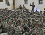A sergeant instructor briefs the latest intake of recruits at Camp Safar on the kit they will receive and use while on course at Regional Military Training Centre–West.