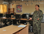 Col Mamur Jan delivers a lesson on the law of armed conflict at the ANA Legal School.