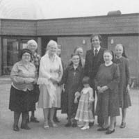 Candid photo of Douglas Cardinal and daughter Lisa, with nuns of St. Joseph's Convent School, 1978, photo courtesy of NeWest Press