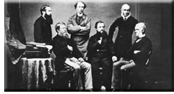 Sir John A. Macdonald (standing, centre) with the other members of the British High Commission.
