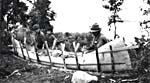 Photograph: Building a birch-bark canoe