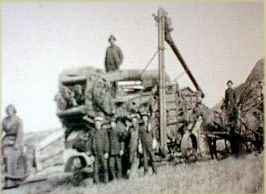 Threshing machine with workers