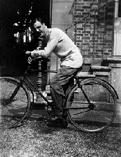 Claude Champagne on his bicycle in Le Vésinet, 1923