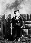 Photographic portrait of Claude Champagne at age four
