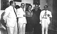 Photograph of Lorenzo Fernandez, Claude Champagne, Bidu Sayao, Jean Morel and Heitor Villa-Lobos, 1946