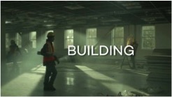 Still image, construction workers inside a building