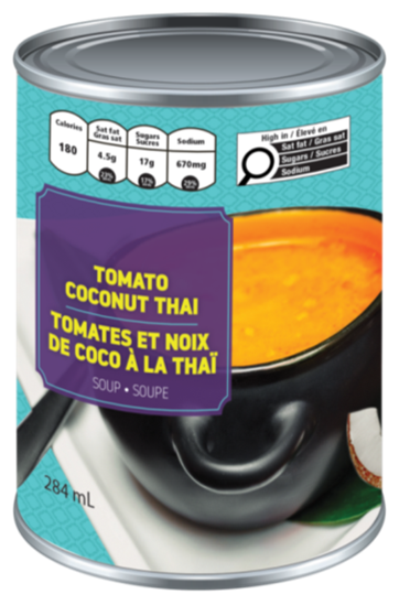 There is an image of the front panel of a can of soup called Tomato Coconut Thai. In the top right corner is the magnifying glass nutrition symbol without the Health Canada attribution indicating that the product is high in saturated fat, sugars and sodium. In the top left corner is numeric nutrition information indicating that the product contains 180 calories, 4.5 g of saturated fat, 17 g of sugars and 670 mg of sodium. 