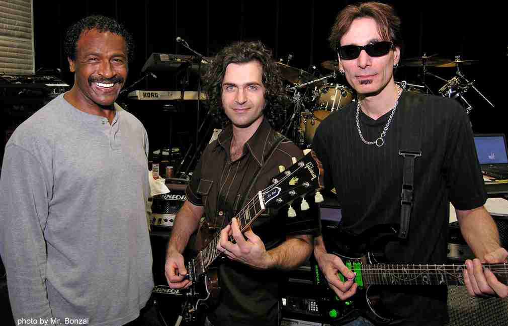 © Mr. Bonzai -- Pictured during rehearsals for the Zappa Plays Zappa Tour are Frank Zappa alumni Napoleon Murphy Brock and Steve Vai flanking Dweezil.  This was the first OFFICIAL presentation of Frank Zappa Music since the Composer himself departed for his final tour in 1993.