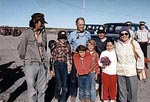 Photograph: Nunatsiaq MP Peter Ittinuar, members of Ittinuar's family, Pierre Trudeau and his three sons at the Rankin Inlet airport, 1983