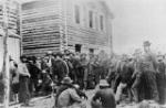 Photograph: Miners awaiting their turns to register their claims.