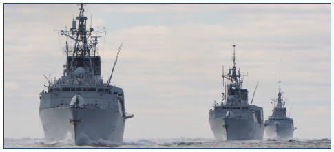 Halifax-class frigates at sea.
