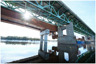 This view from underneath the bridge shows the smooth and careful operation in progress