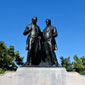 A monument to Robert Baldwin and Sir Louis-Hippolyte Lafontaine, shows the two men standing side-by-side mounted on a semi-circular base