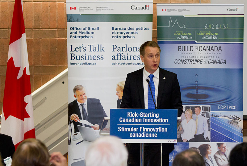 Man standing behind a podium.