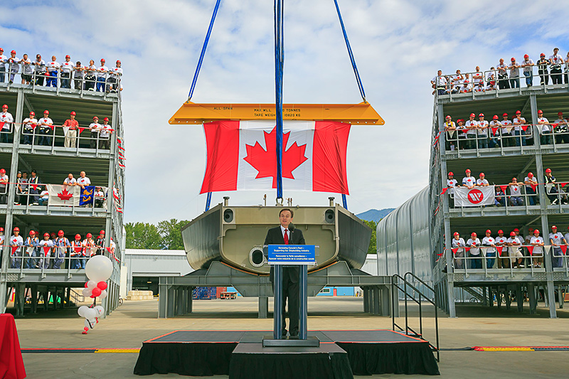 Man standing behind a podium.