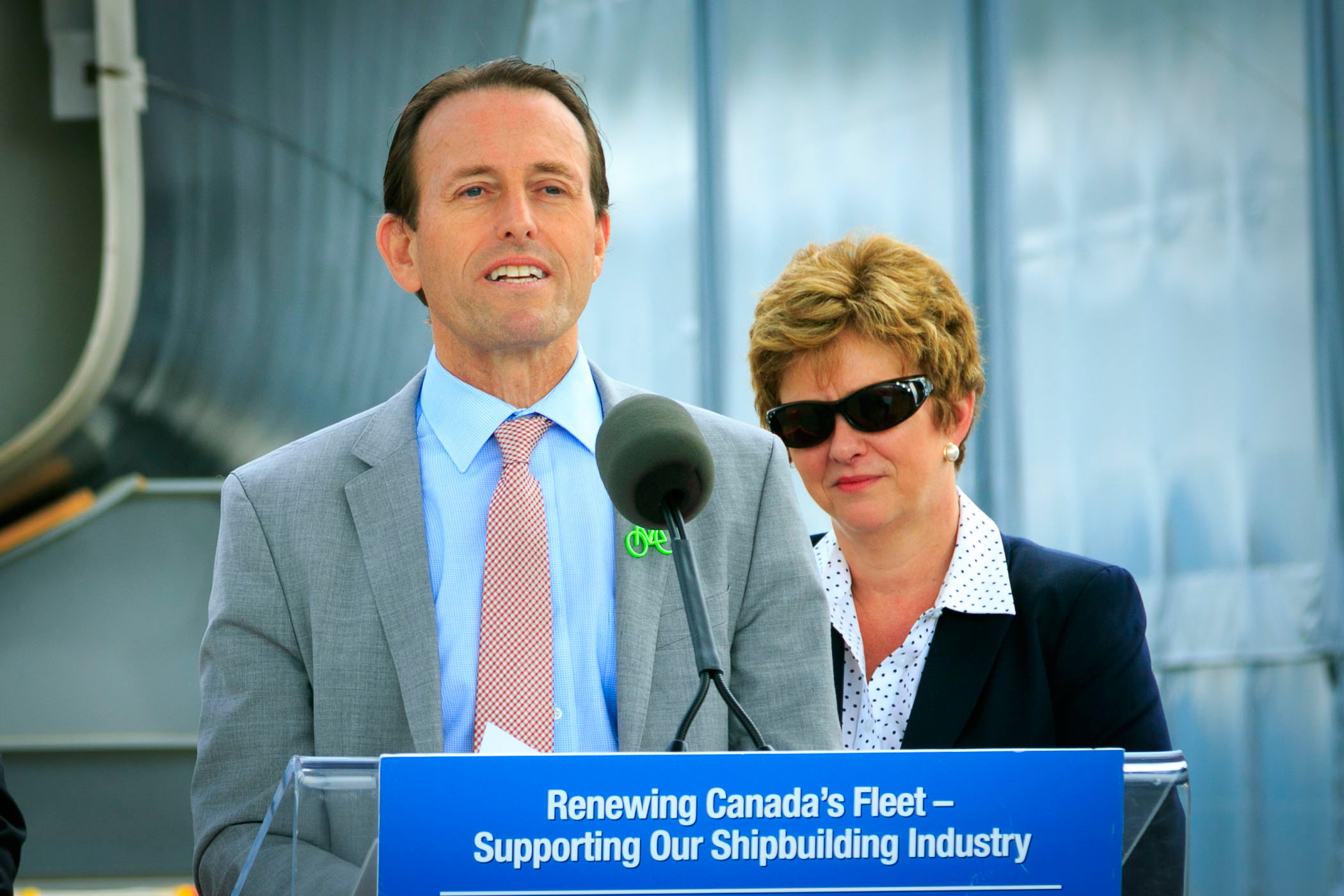 Man standing behind a podium.