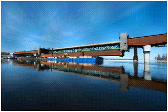 A panoramic view of the new Des Allumettes Bridge with the centre steel section being lifted into place