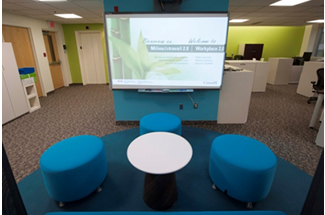 Area for collaboration with soft seating and an interactive whiteboard, Gatineau, QC