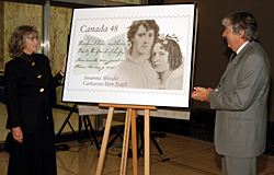 Mrs. Jay Gibson, great-great granddaughter of Catharine Parr Traill and great-great grandniece of Susanna Moodie, and Roch Carrier unveiling the stamp honouring the Strickland sisters
