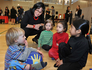 Federal Health Minister Leona Aglukkaq engages with children at the Metro Central YMCA, Monday, March 7, 2011, in Toronto 