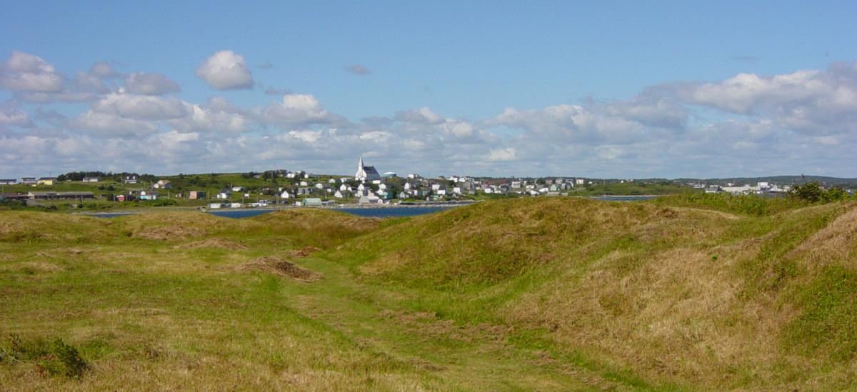 Looking across the ruins of the Grassy Island Fort toward the town of Canso