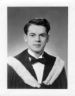 Formal graduation photo of Etienne Gaboury, in gown, 1953