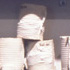 Hanson: "...she ought to have wondered at this, but at the time it all seemed quite natural." (Detail of shelves and cans)