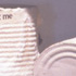 Hanson: "...she ought to have wondered at this, but at the time it all seemed quite natural." (Detail of shelves and cans)