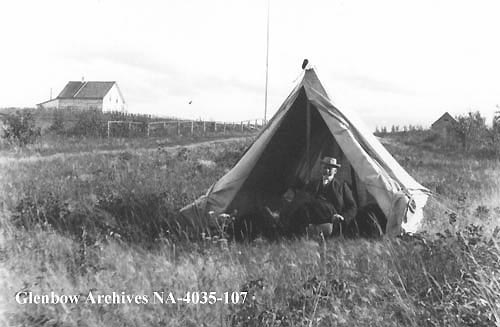 Doctor O.C. Edwards and his tent at Athabasca Landing Alberta. 1899