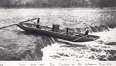 Scow going over Cascade rapids