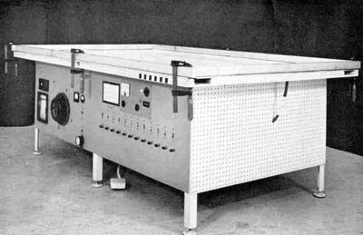 9 Vacuum hot table showing control panel and automatic temperature recorder at extreme left.