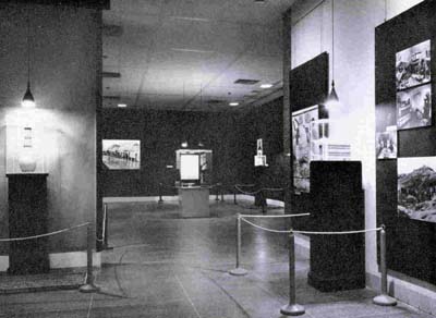 Looking from the second gallery into the first gallery. In the right foreground is an alabaster box; on the extreme left a tall alabaster vase.