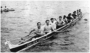 The Golden Arrow racing canoe from the SKWAH reserve, participating in the annual Cultus Lake canoe races, 1968. P2678.