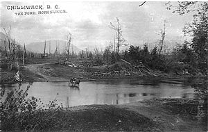 Horse and carriage entering the water at the ford at Hope Slough, ca. 1908. P1987 167 18.