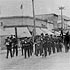 Band leading merchants parade, in front of the A.M. Rockwell feed and flour company building on Wellington Avenue, ca. 1910.  P955