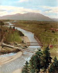 Hand coloured photograph showing overhead view of bridges at Vedder Crossing and Vedder River, ca. 1943-1944. P5674.