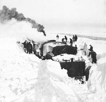Train stuck in snow near Radville
