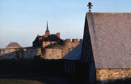 Buildings with King's Bastion Tower in background at sunset
5J-3-212