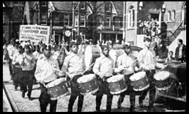 Photo of the young people in the TNT (Toronto Negro Trumpeters) lead Parade.  At the height of their success, they had about one hundred members.