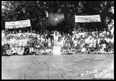 Photo of an anti-war demonstration at Camp Yungvelt in 1937.  The banners read: "War is murder, the promoters murderers," and "We want our fathers with us and not in the war."