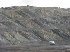 "The bus shown here helps us understand the heigh of the bences at the mine"