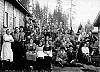 Logging crew with their families at logging camp at Elk Bay.