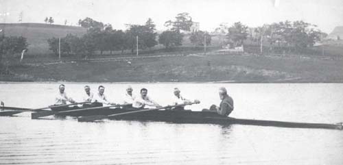 The Outer Cove Crew rowing on Quidi Vidi lake