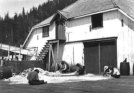 Mending nets at Skeena River Cannery