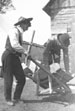 Men with wheel barrow