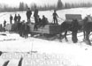 Horse teams pulling sleds