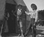 Men in front of tent