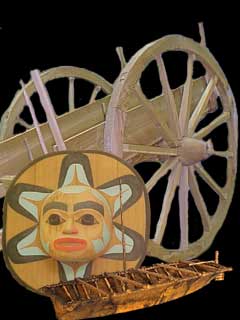 Picture of red river cart, canoe and drum 
